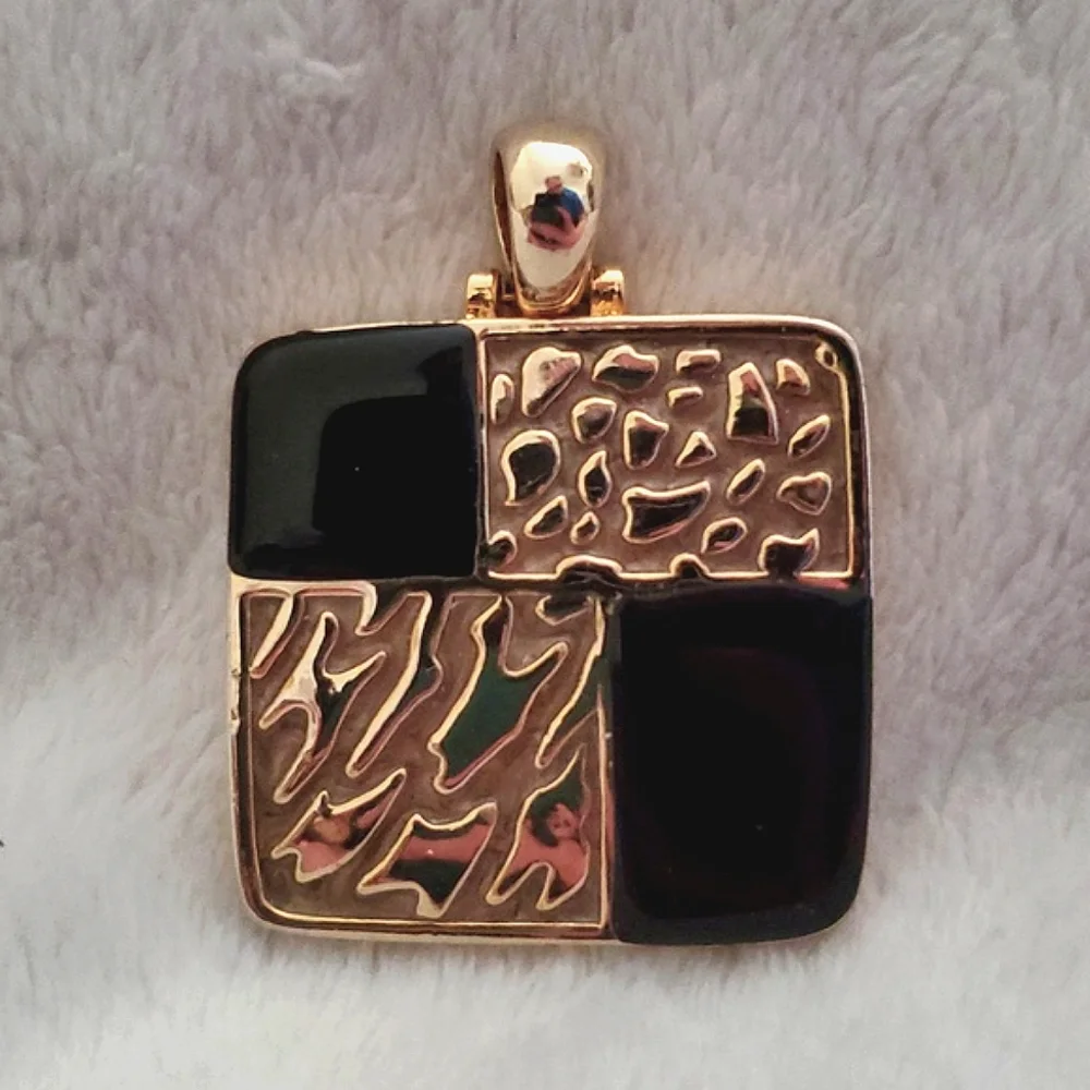Kenneth Cole Black and Goldtone Pendant - Picture 1 of 8